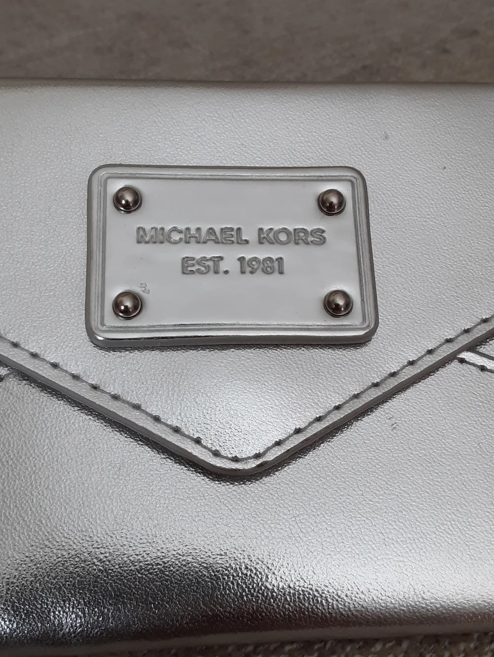 Michael Kors Metallic Silver Envelope Pouch  Clutch